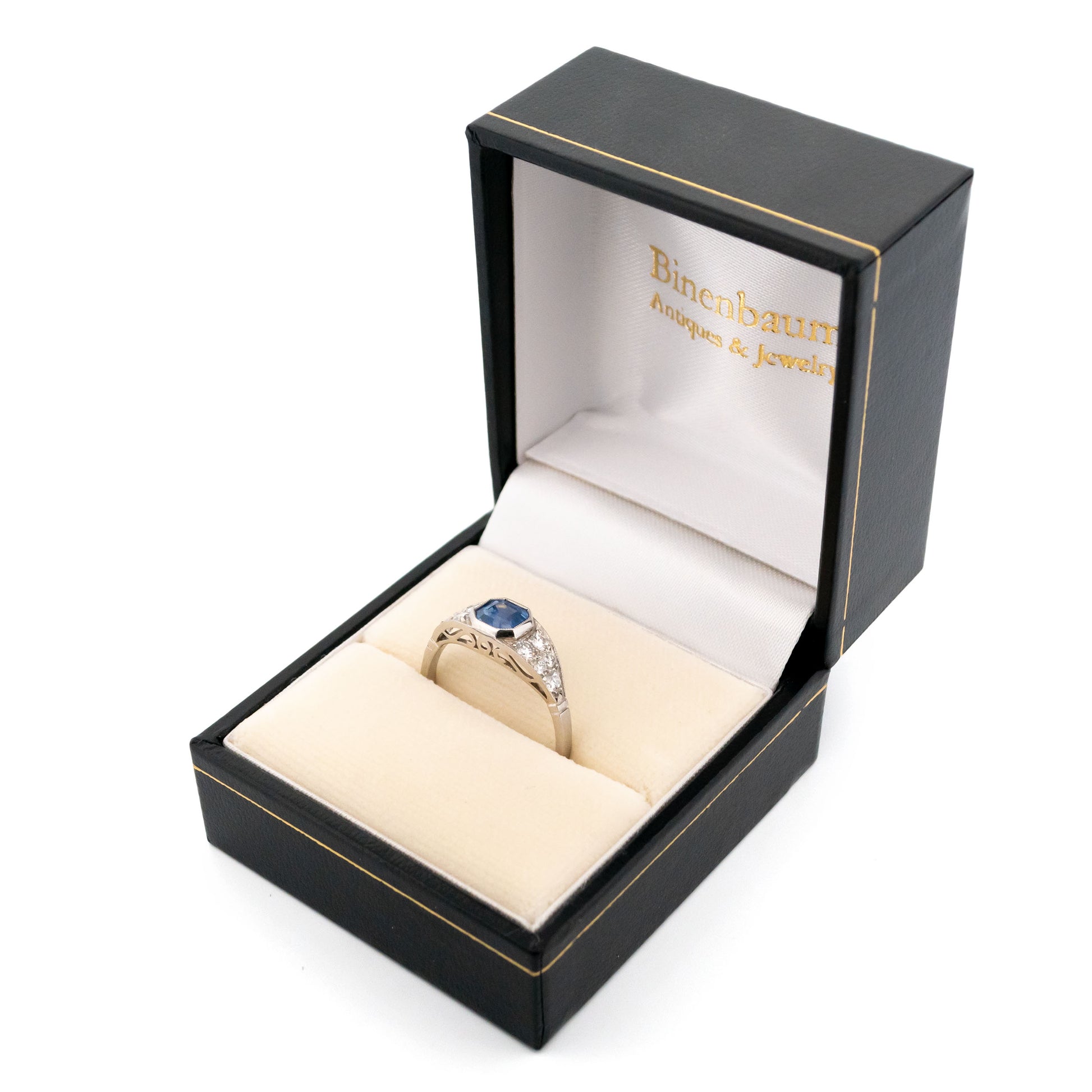 A sapphire and diamond ring in platinum, in a ring box