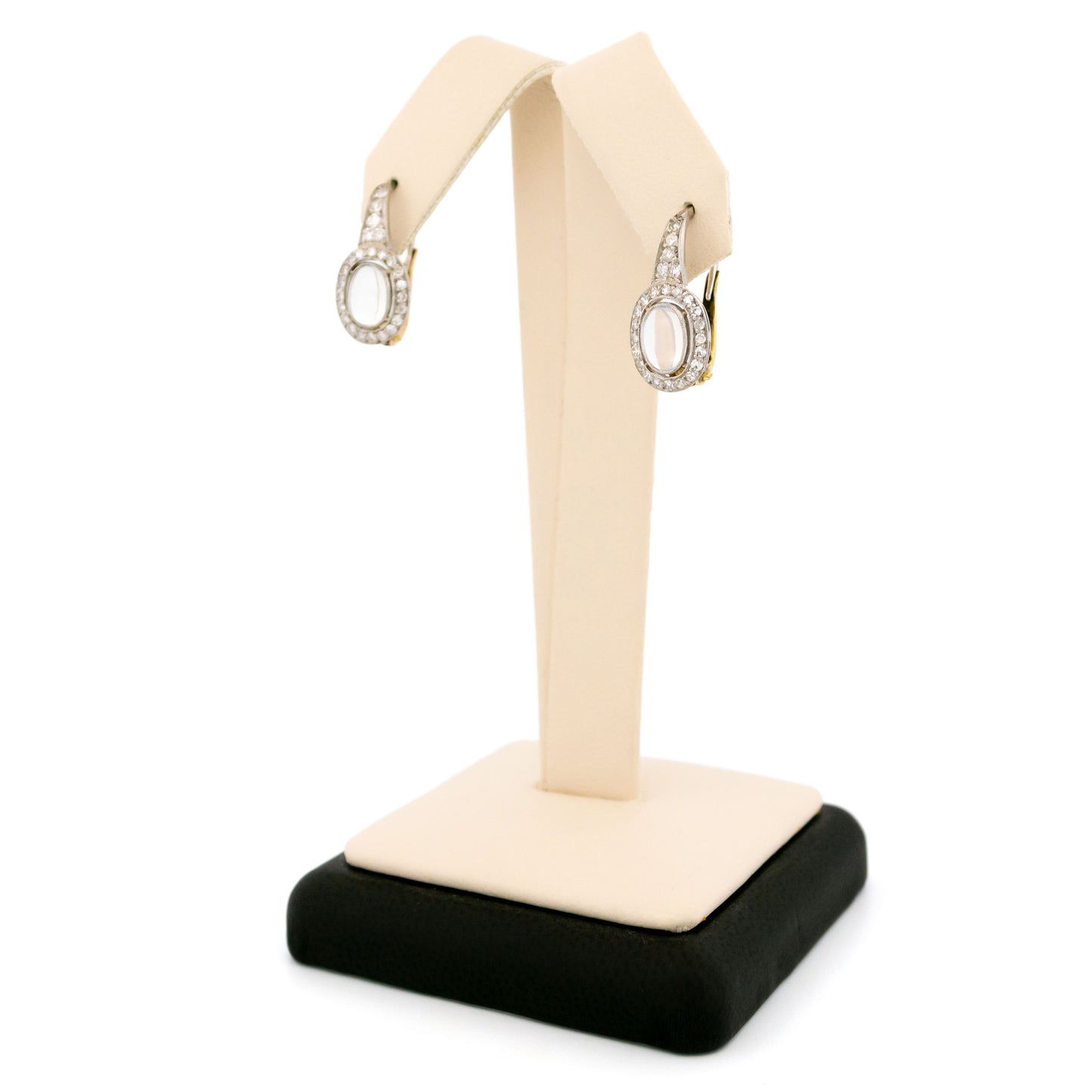 A pair of moonstone and diamond drop earrings in platinum and gold