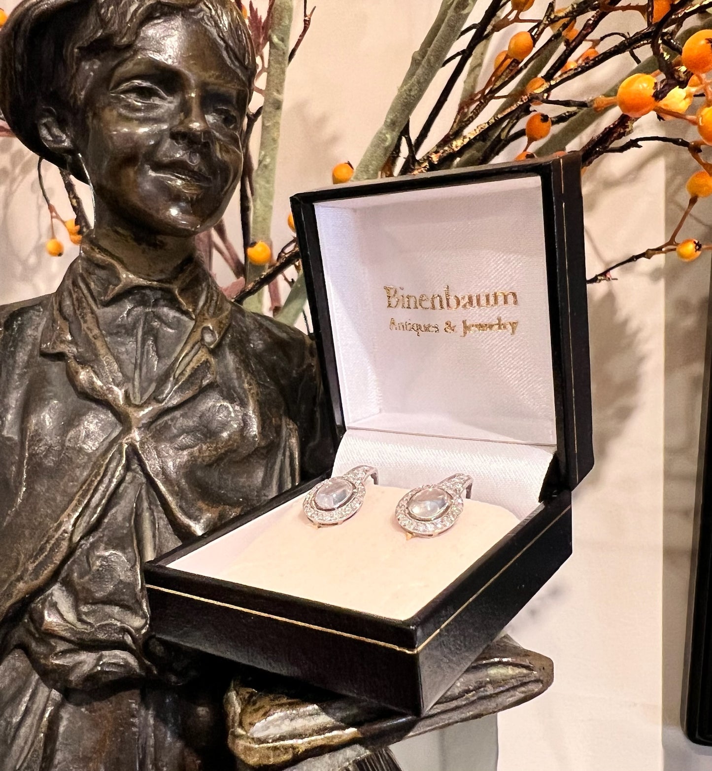 A pair of moonstone and diamond drop earrings in platinum and gold, in a box