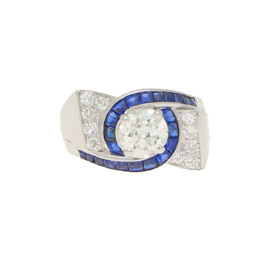 Oscar Heyman Art Deco Diamond and Sapphire Twist Bow Cocktail Ring in Platinum, designed by Oscar Heyman for David Gumbiner