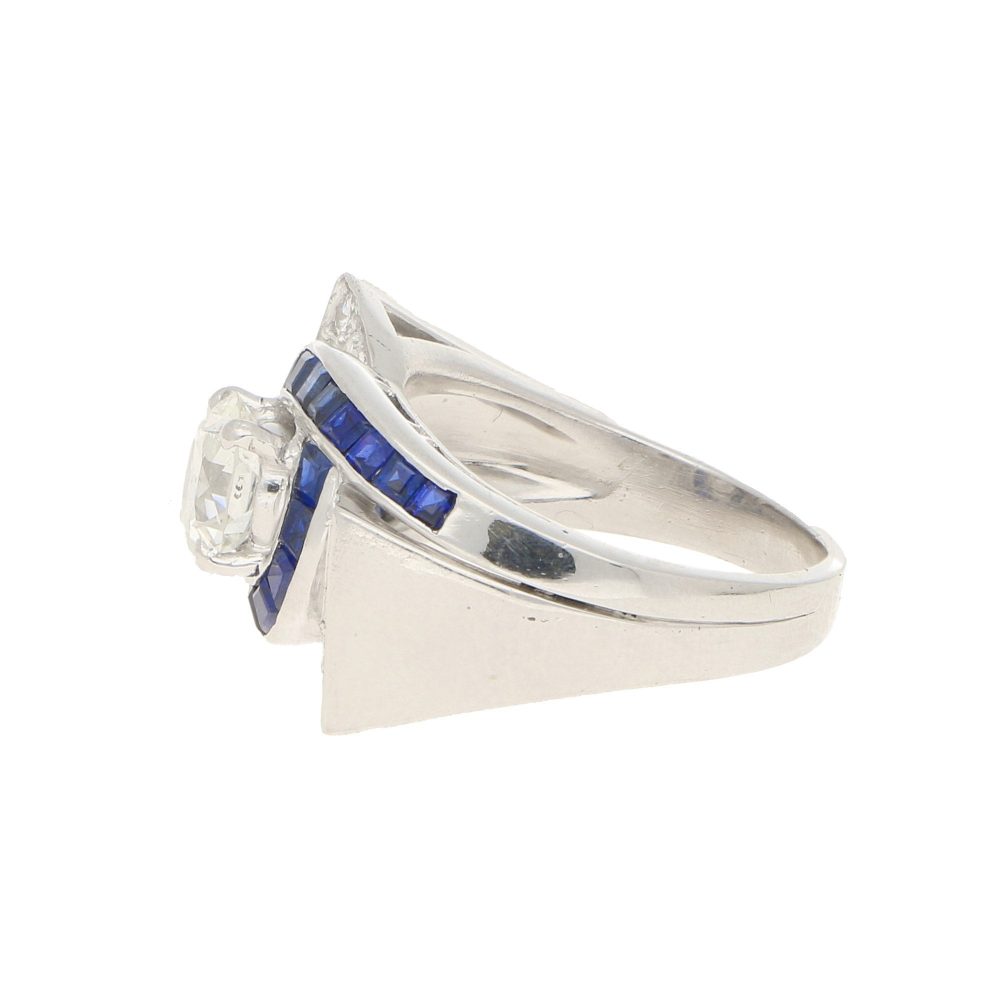 Oscar Heyman Art Deco Diamond and Sapphire Twist Bow Cocktail Ring in Platinum, designed by Oscar Heyman for David Gumbiner