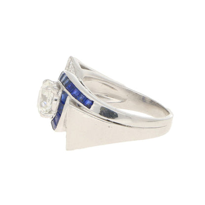 Oscar Heyman Art Deco Diamond and Sapphire Twist Bow Cocktail Ring in Platinum, designed by Oscar Heyman for David Gumbiner