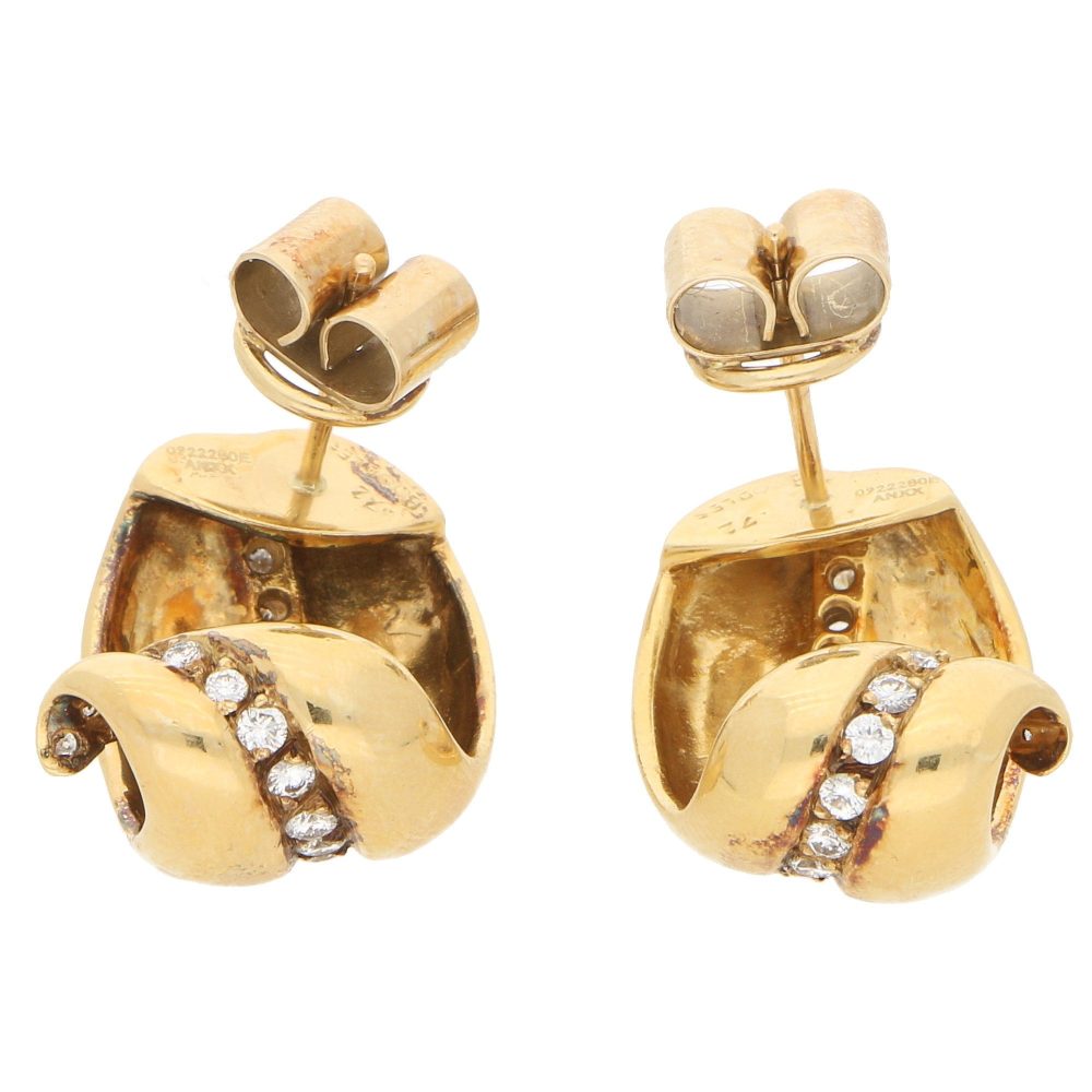 Vintage Boodles diamond leaf earrings in gold.