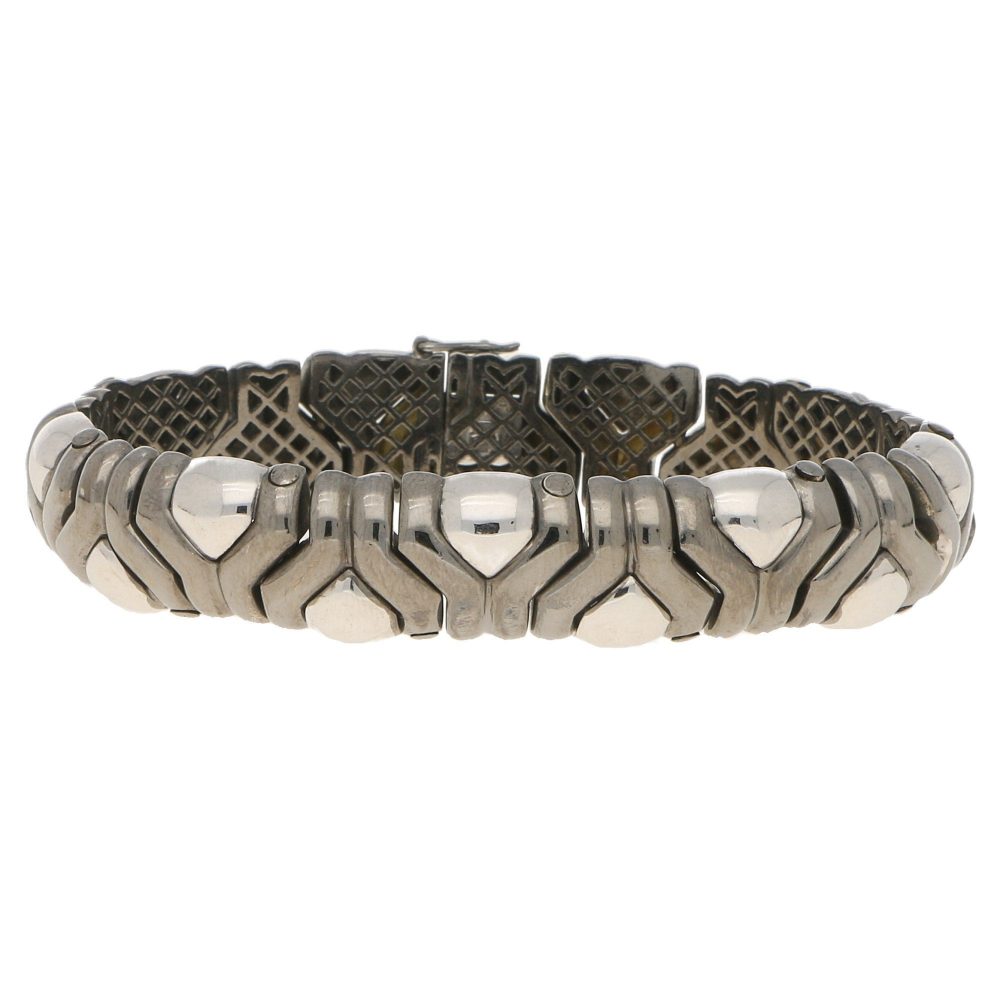 Vintage Italian Aztec Style Mosaic Bracelet in Black and White Gold; articulated links composed of Y-shape black gold sections with white gold accents