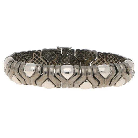 Vintage Italian Aztec Style Mosaic Bracelet in Black and White Gold; articulated links composed of Y-shape black gold sections with white gold accents