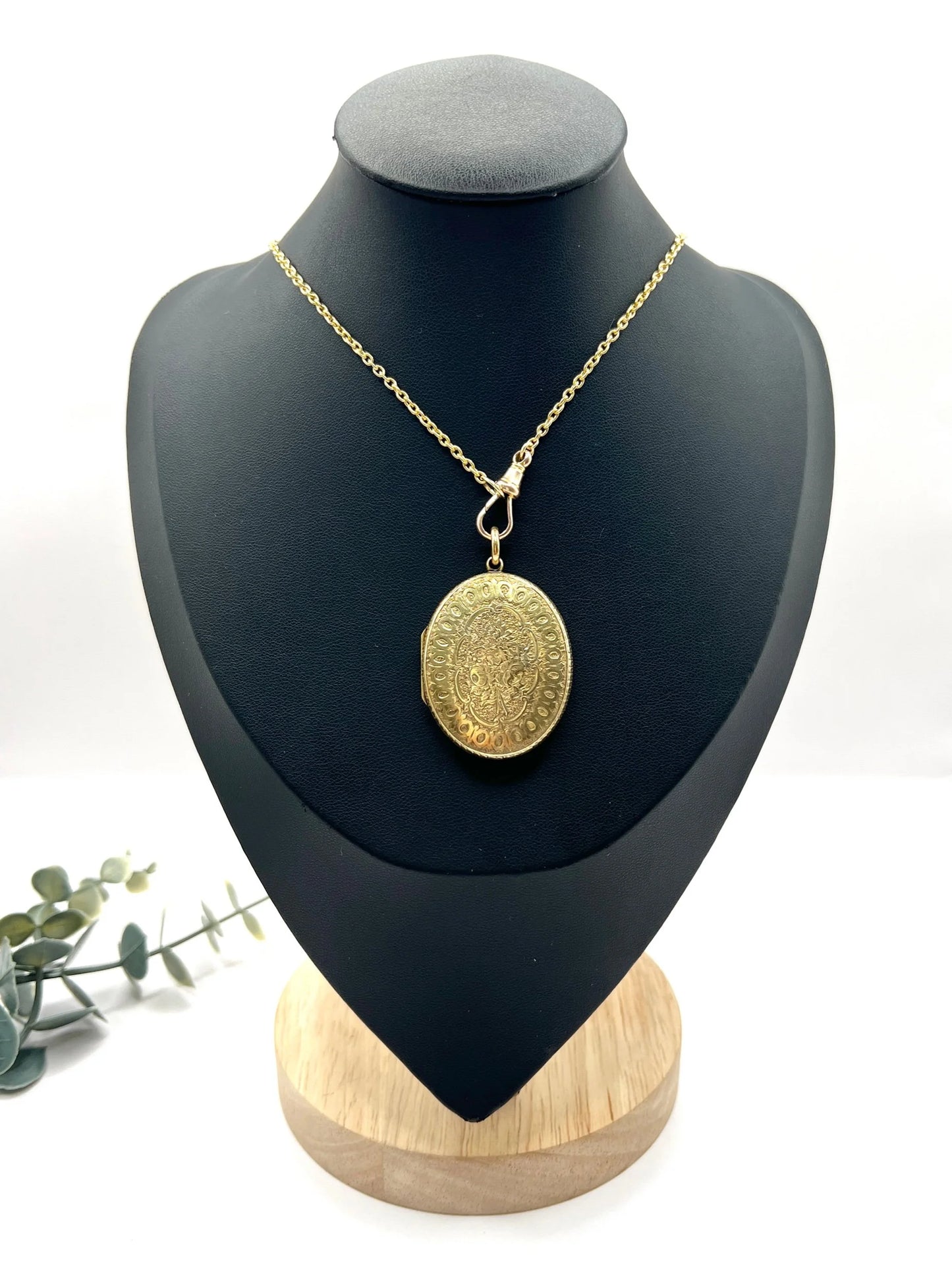 Early Victorian 15 Carat Yellow Gold Floral Engraved Oval Shaped Locket, Circa 1860