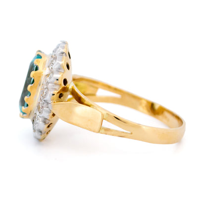 18 Carat Yellow and White Gold Aquamarine and Diamond Oval Cluster Ring