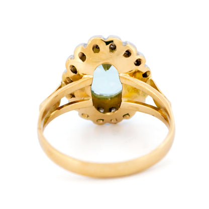 18 Carat Yellow and White Gold Aquamarine and Diamond Oval Cluster Ring