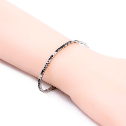 Vintage White And Black Diamond Tennis Bracelet In 18 Carat White Gold