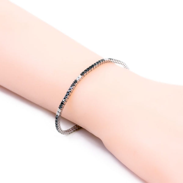 Vintage White And Black Diamond Tennis Bracelet In 18 Carat White Gold