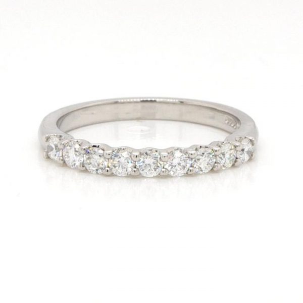 Diamond and Platinum Nine Stone Half Eternity Ring, 0.50 carat total; platinum half eternity ring set with nine brilliant cut diamonds, all claw set adjacently