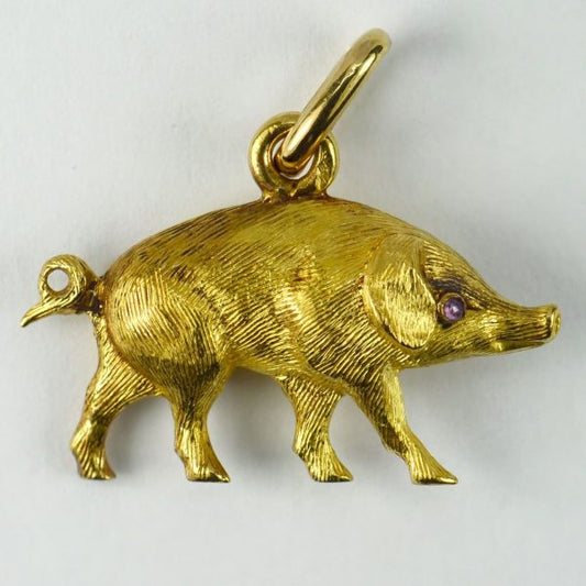 French 18ct Yellow Gold Pig Charm Pendant with Ruby Eye; realistically designed as three-dimensional pig accented with rose-cut ruby eyes