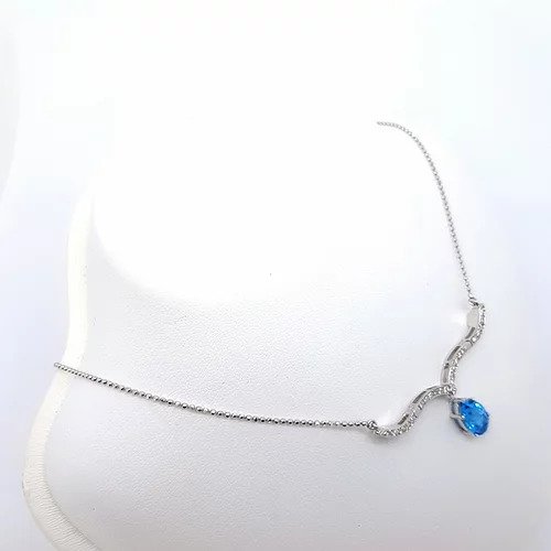 Blue Topaz and Diamond Articulated Illusions Pendant Necklace; with moveable diamond set sections to wear either as a cluster pendant or a drop necklace, in 18ct white gold