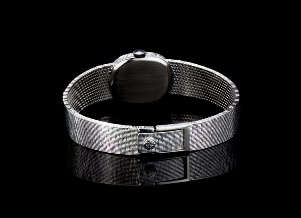 Patek Philippe Mini Ellipse 18ct White Gold Ladies Vintage Manual Watch, on an 18ct Patek Philippe bracelet strap