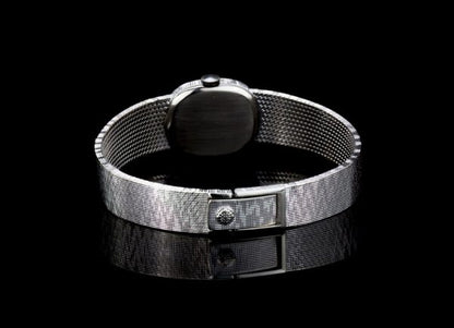 Patek Philippe Mini Ellipse 18ct White Gold Ladies Vintage Manual Watch, on an 18ct Patek Philippe bracelet strap