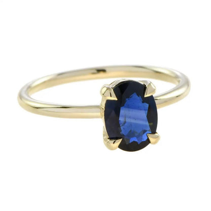 Oval Sapphire Solitaire Engagement Ring in Yellow Gold