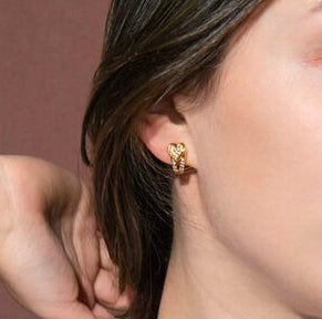 Boucheron Vintage Diamond and 18ct Gold Heart Clip on Earrings; set with 0.92cts brilliant-cut diamonds, in original case, Signed and numbered, Circa 1960.