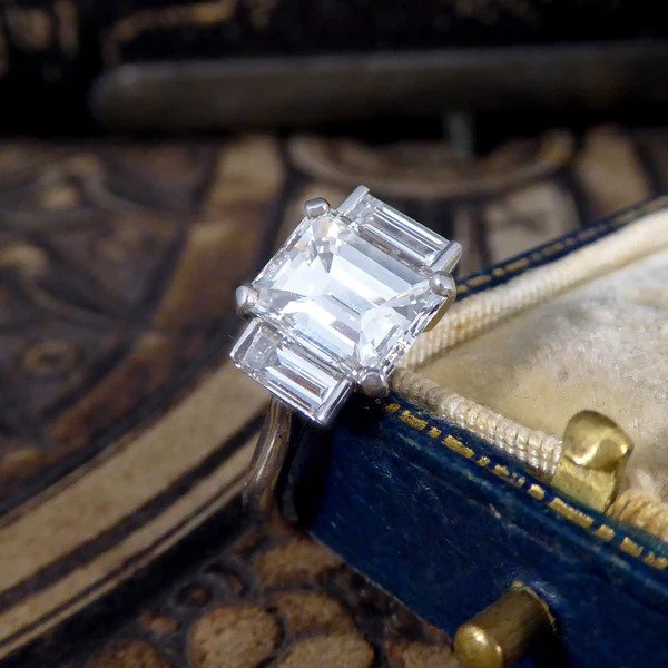 2.57ct Emerald and Baguette Cut Diamond Three Stone Engagement Ring in Platinum