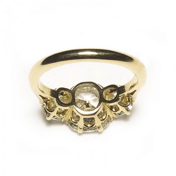 3.13ct Cushion Cut Diamond Three Stone Ring; cushion-cut diamond flanked by round old-cut diamonds, 18ct yellow gold, with GIA certificate