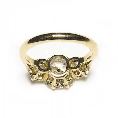 3.13ct Cushion Cut Diamond Three Stone Ring; cushion-cut diamond flanked by round old-cut diamonds, 18ct yellow gold, with GIA certificate