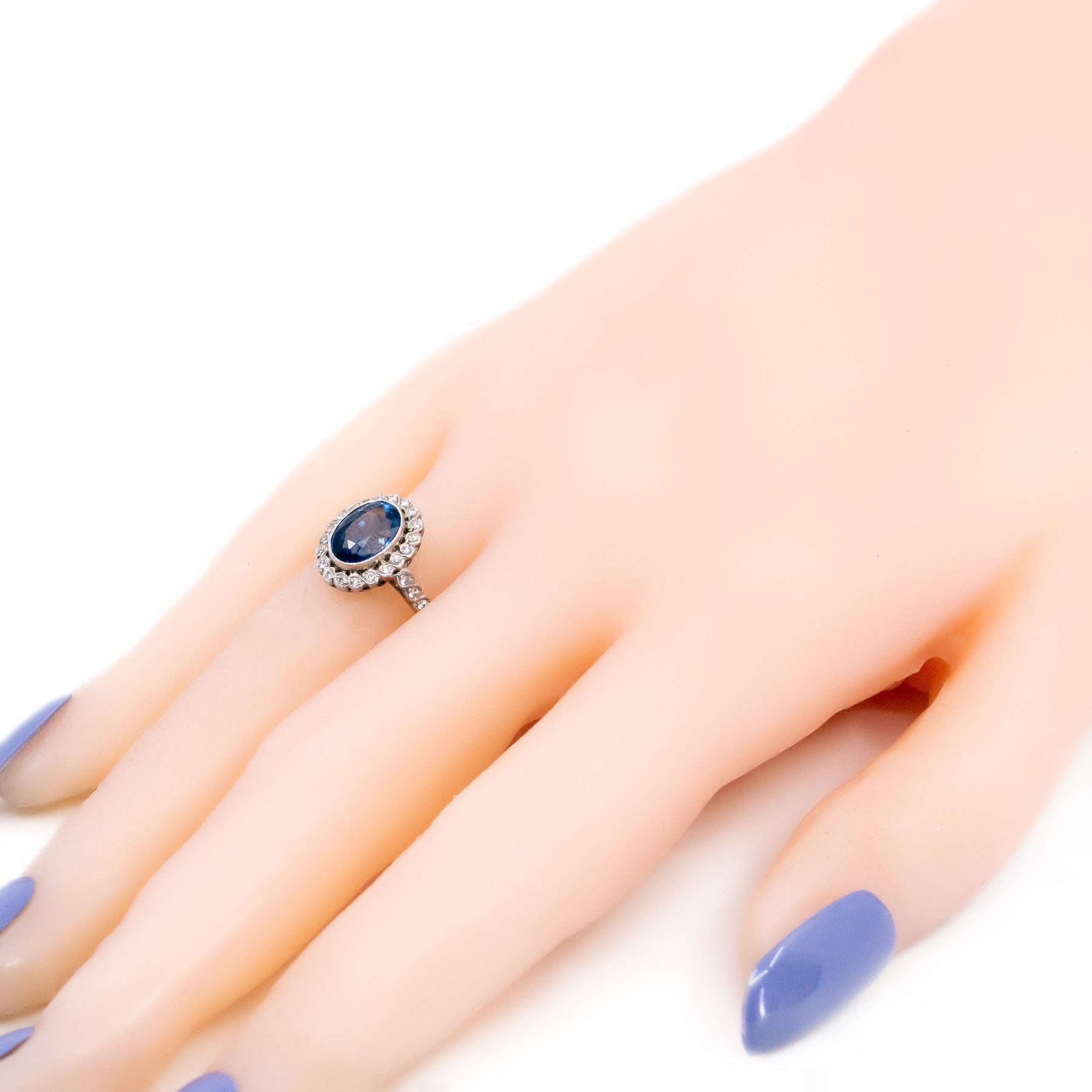 Platinum, Sapphire and Diamond Oval Cluster Ring, 2.04 Carats