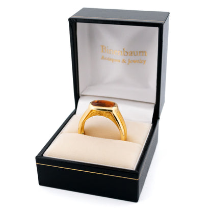A yellow gold citrine ring, in a ring box