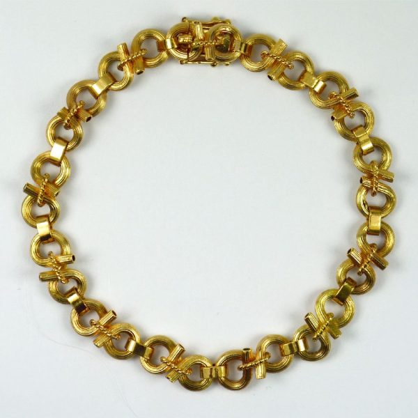 French Yellow Gold Open Loop Rope Twist Link Bracelet; comprised of 14ct yellow gold figure of 8 open loop links and rope twists, 7" long