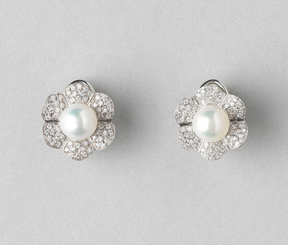 Akoya Pearl and Diamond Flower Cluster Earrings; 8.5mm Akoya pearls surrounded by 0.70cts diamond-set petals, in 18ct white gold, Italian, By Georgio Visconti