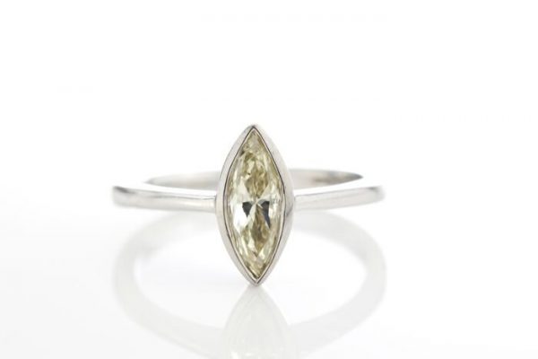 0.81ct Marquise Cut Diamond and Platinum Ring with GIA Certificate; elegant single stone diamond ring crafted from platinum, set with a 0.81 carat marquise brilliant cut diamond. Made by WEB in Birmingham, Circa 2000s. Comes with GIA certificate