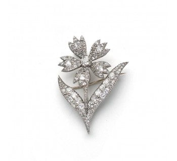 Antique Georgian Diamond Flower Brooch; with old mine cut diamonds totaling approximately 5.50 carats, mounted in silver-upon-gold, Circa 1790