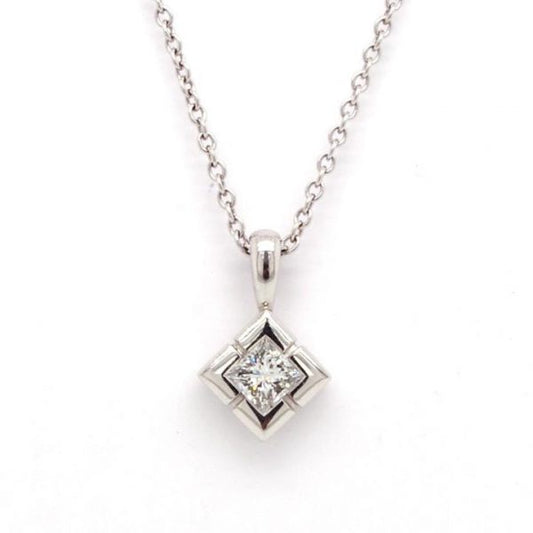 Diamond Single Stone Pendant; platinum diamond-shaped mount set with a single 0.25 carat round diamond, on an 18ct white gold 20" trace chain