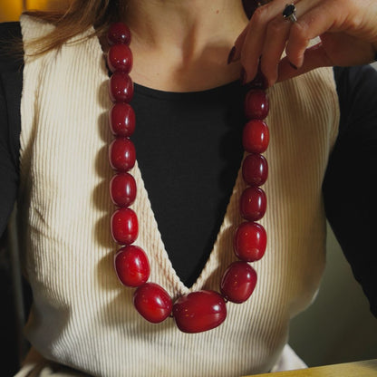 Vintage Red Bakelite Bead Necklace, graduated rich deep red beads with a high-gloss finish giving a bold statement look. Circa 1930s - 1940s