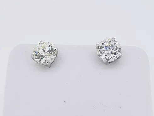 Pair of Diamond Stud Earrings; 2.86 carat total, round brilliant-cut diamonds, four-claw set, in 18ct white gold, G/H colour, VS2 clarity.