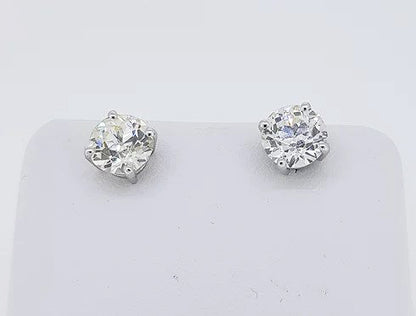 Pair of Diamond Stud Earrings; 2.86 carat total, round brilliant-cut diamonds, four-claw set, in 18ct white gold, G/H colour, VS2 clarity.
