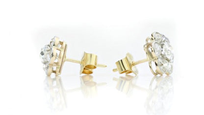 Antique Victorian Old Cut Diamond Floral Cluster Stud Earrings; set with 1.44 carats old cut diamonds arranged in a flower cluster design, in 18ct yellow gold, 19th century, Circa 1860s