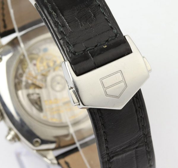 Tag Heuer Monza 38mm Steel Automatic Chronograph; Ref. CR5110, black dial with Arabic numerals, calibre 36 movement visible through the display back, on a TAG Heuer black leather strap with stainless steel push-button deployment buckle.