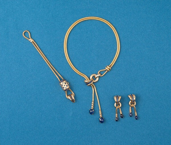 Retro 24cts Sapphire and 18ct Gold Necklace, Earrings, Bracelet Suite; double-snake chain necklace, earrings and bracelet with a hidden watch, Circa 1940.