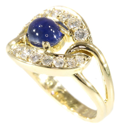 Vintage Cartier sapphire and diamond ring in gold.