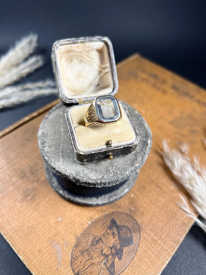 A yellow gold blue glass intaglio signet ring, in a ring box