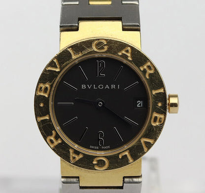 Bvlgari Ladies 18ct Yellow Gold and Steel 23mm Quartz Watch; black dial, date indicator and sapphire crystal, on Steel and gold bracelet with fold over clasp