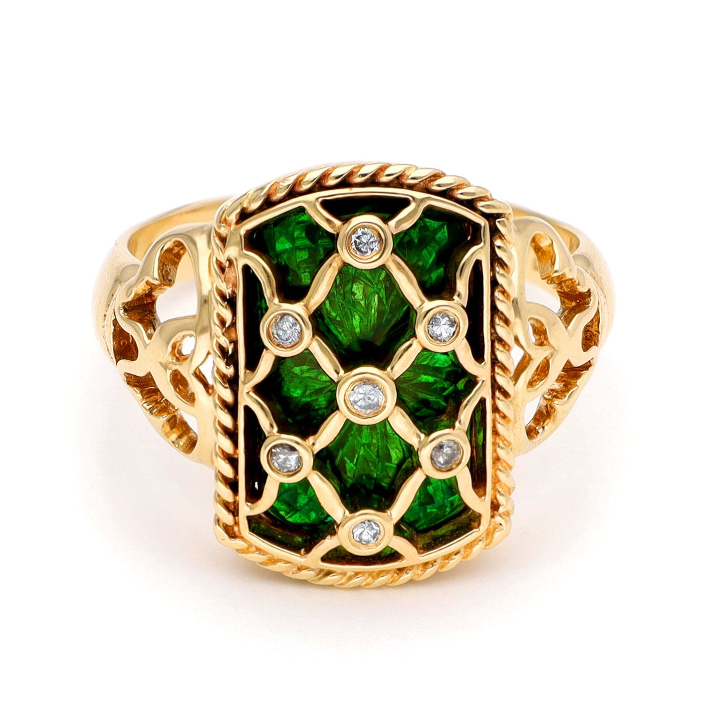 A yellow gold ring with green enamel and round diamonds set into a trellis design, against a white background