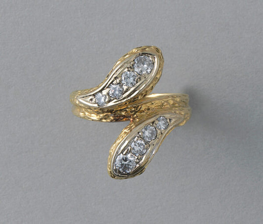 Vintage Diamond and 18ct Yellow Gold Snake Ring; two snake heads set with graduating brilliant diamonds, scaly structure to shank, France, Circa 1970. Attributed to Van Cleef & Arpels