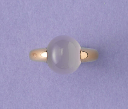 Contemporary Chalcedon and 18ct Gold Luna Ring; set with a cabochon cut oval chalcedon, in 18ct rose gold, Signed and numbered: Pomellato C260026575