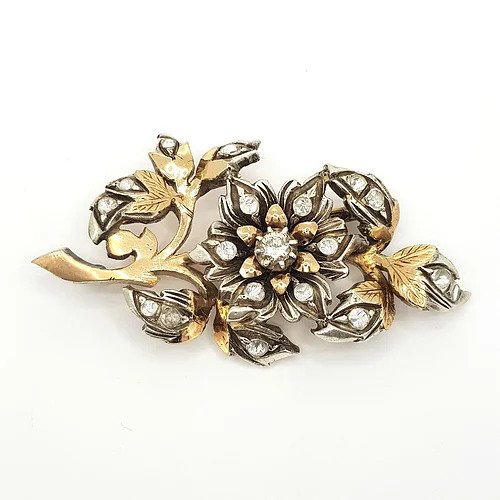 Vintage Diamond Floral Spray Brooch; mid/late 20th century floral spray brooch crafted from yellow and white gold and set with diamonds