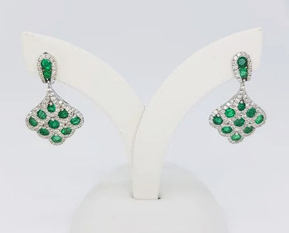 1.30ct Emerald and Diamond Fan Shaped Cluster Drop Earrings; round faceted emeralds encompassed by 0.70cts diamonds, in 18ct white gold.