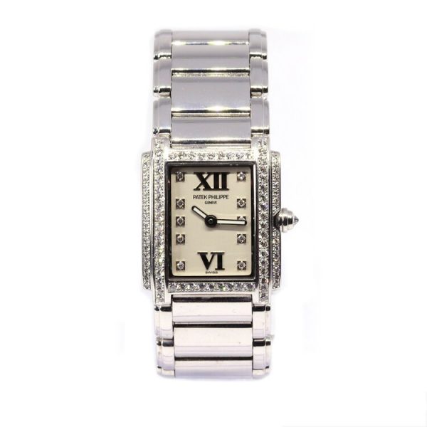 Patek Philippe Twenty-4 18ct White Gold and Diamond 22mm Quartz Watch, ref 4908, rectangular off-white dial with diamond dot hour markers, diamond set bezel and crown, on 18ct white gold bracelet with a double deployant clasp, with Patek Philippe box and papers