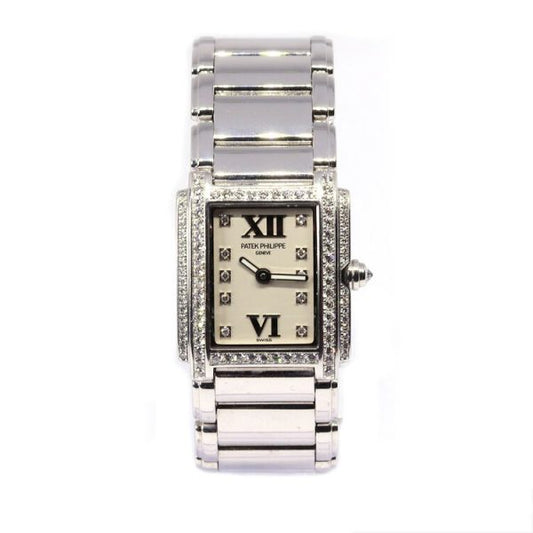 Patek Philippe Twenty-4 18ct White Gold and Diamond 22mm Quartz Watch, ref 4908, rectangular off-white dial with diamond dot hour markers, diamond set bezel and crown, on 18ct white gold bracelet with a double deployant clasp, with Patek Philippe box and papers