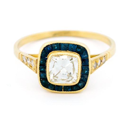 0.77ct Cushion Shape Diamond and Sapphire Target Cluster Engagement Ring in 14ct Gold