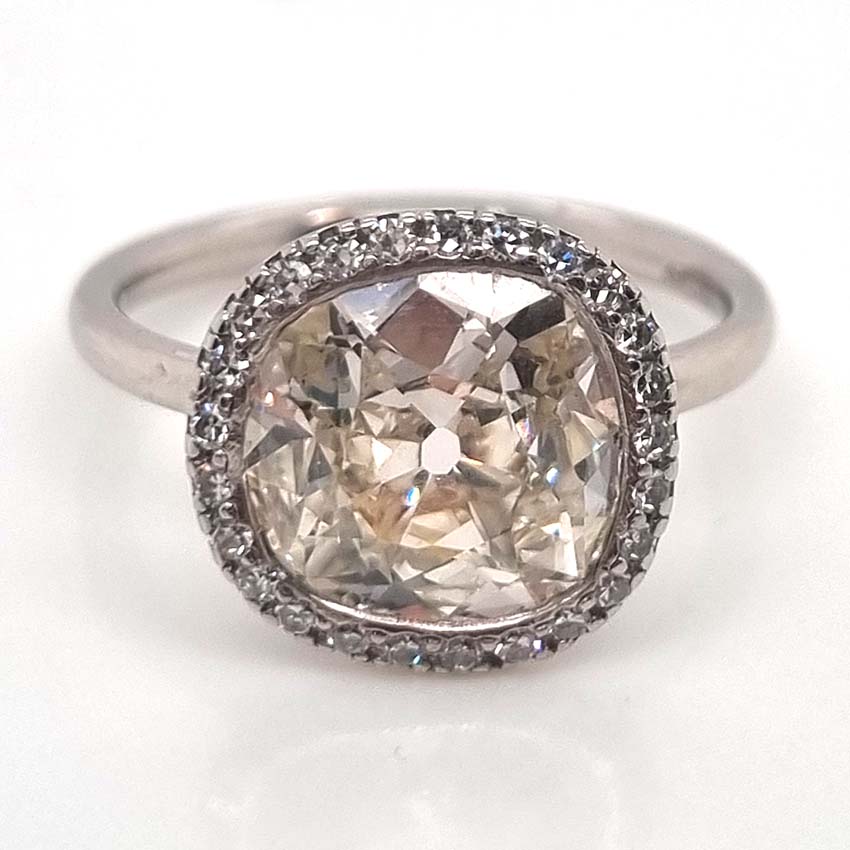 Vintage 3.15ct Cushion Old Cut Diamond Halo Cluster Engagement Ring in Platinum