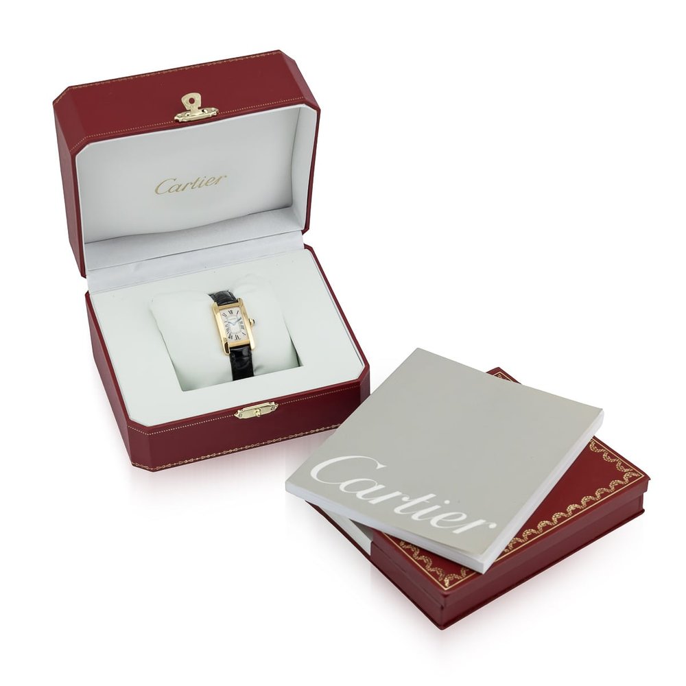 Vintage Cartier Tank Americaine 2482 Ladies 18ct Yellow Gold Quartz Watch on black crocodile strap with fitted yellow gold pink buckle. Comes with original red Cartier box and Cartier papers